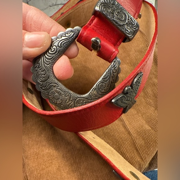 Title:
Vintage Ginnie Johansen Red Leather Western Belt w/ Ornate Silver Buckle - Picture 5 of 5